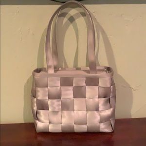 Harvey’s champagne colored seatbelt bag